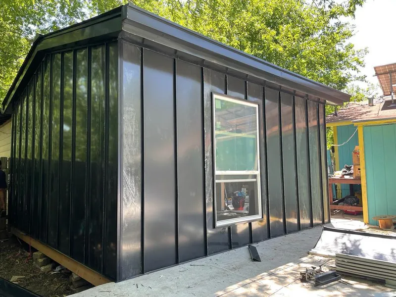 Black standing seam metal wall panels for Roof Inspection in Elkhart