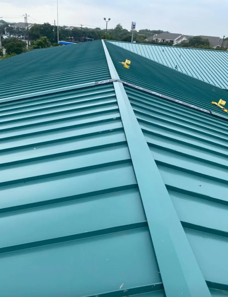 Green commercial metal roof ridge and valley for Metal Roof Repair in Elkhart